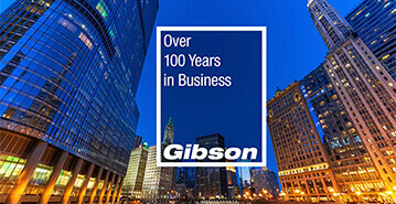 Downtown Chicago with the Gibson logo over it saying Over 100 Years in Business